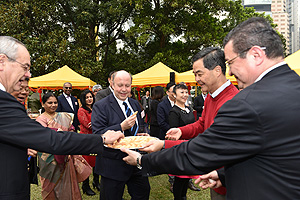 The guests sampling some traditional Lunar New Year food.