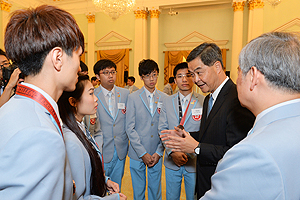 Chatting at the tea gathering with contestants of the WorldSkills Competition.