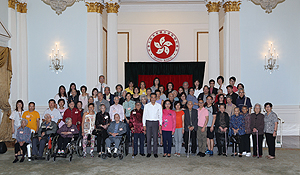 My wife Regina and I join a group photo with all participants. All the elderly guests are full of vitality.