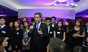 A group photo with some winners of the Hong Kong Scholarship for Excellence Scheme and other Hong Kong people.