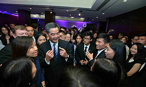 A group photo with some winners of the Hong Kong Scholarship for Excellence Scheme and other Hong Kong people.