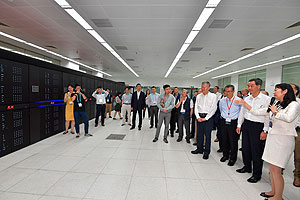 Visiting the national supercomputer Tianhe-2 with the delegation.